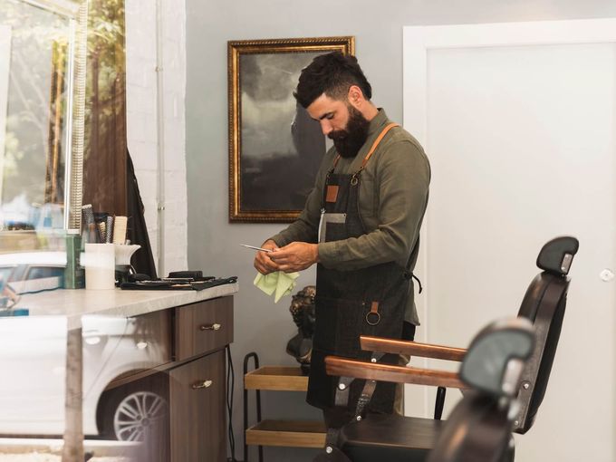 Modern hair salon interior with professional styling chairs and equipment