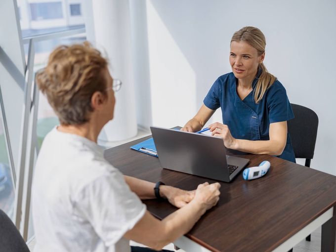 Medical professional in clinical setting providing healthcare services