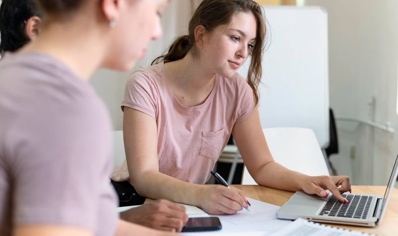 Tutor conducting educational session with student
