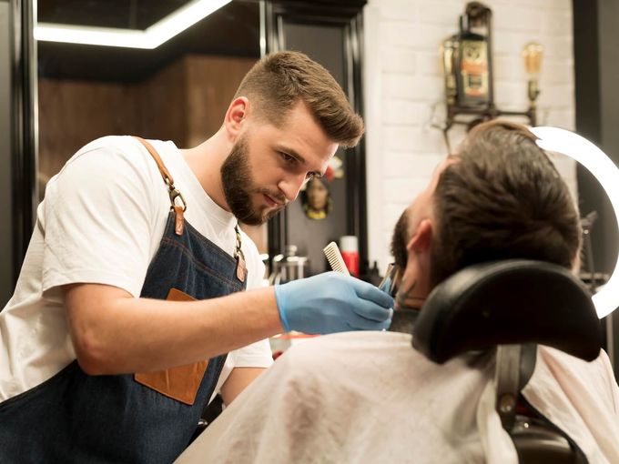 Professional barber shop interior with classic styling chairs