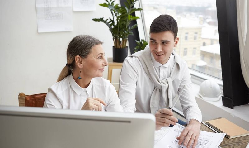 Modern real estate office with property listings